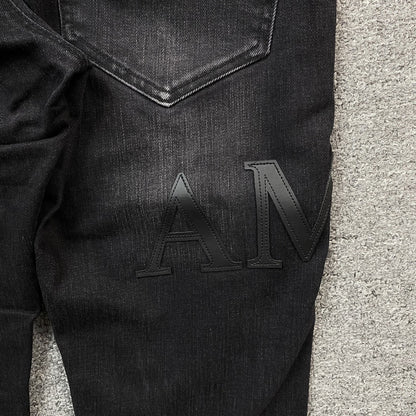 AMIRI CORE APPLIQUE BLACK LEATHER JEANS