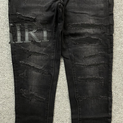 AMIRI CORE APPLIQUE BLACK LEATHER JEANS