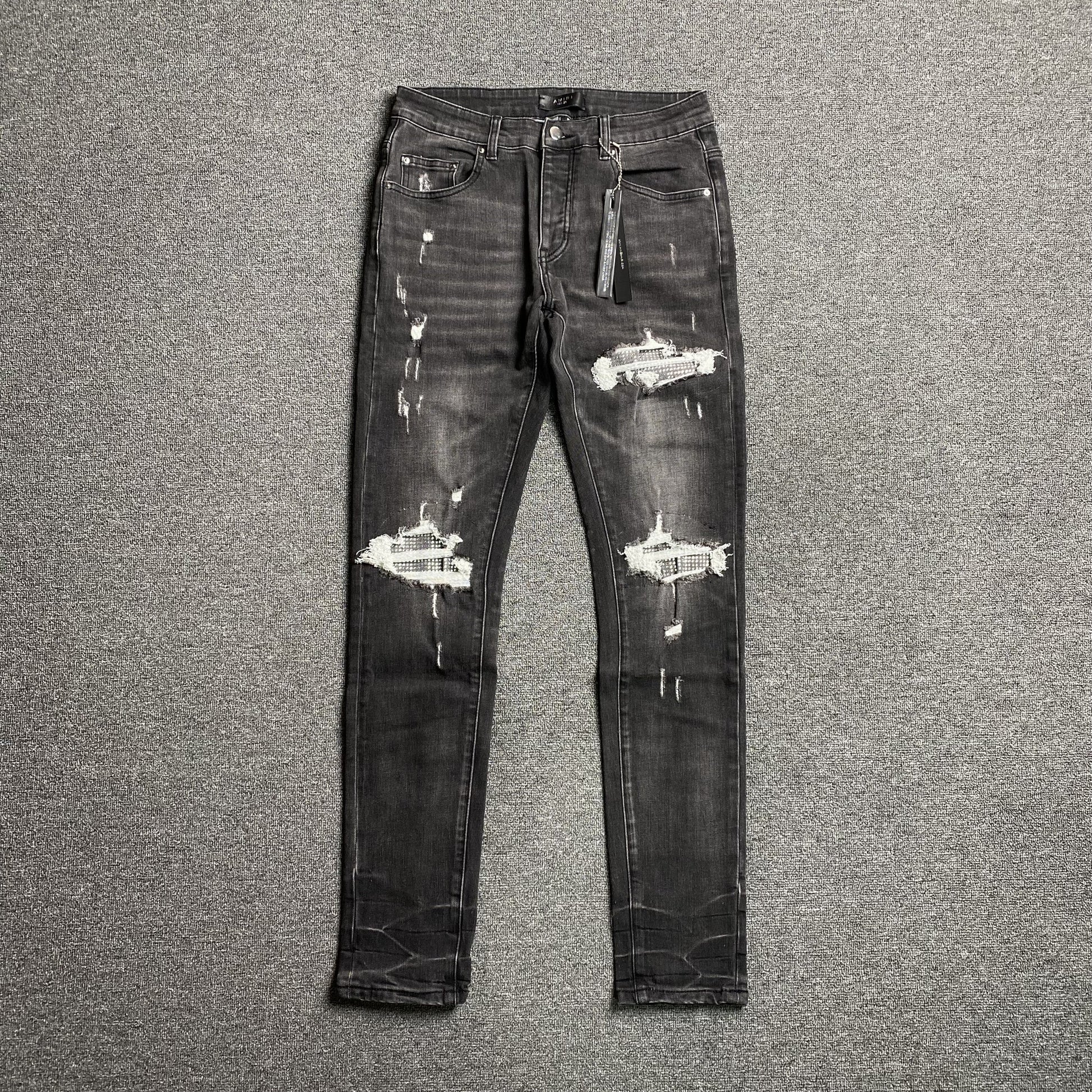 AMIRI SLASH SLIM JEANS