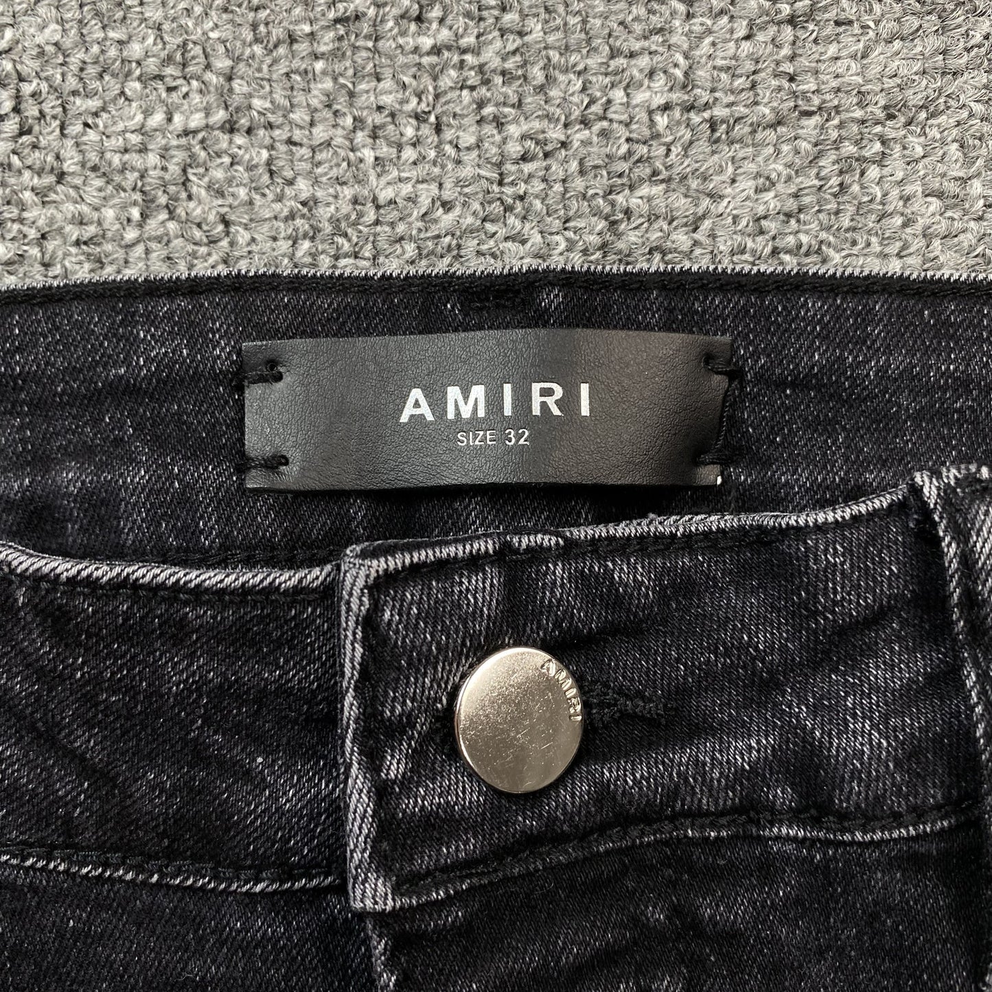 AMIRI VARSITY LOGO REPAIR JEANS