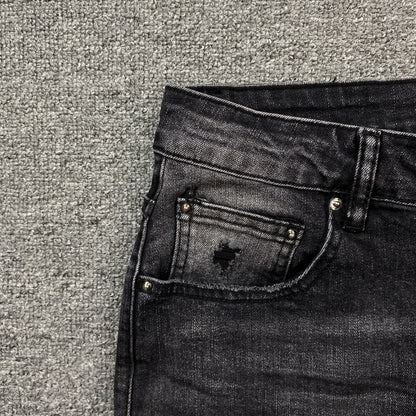 AMIRI VARSITY LOGO REPAIR JEANS