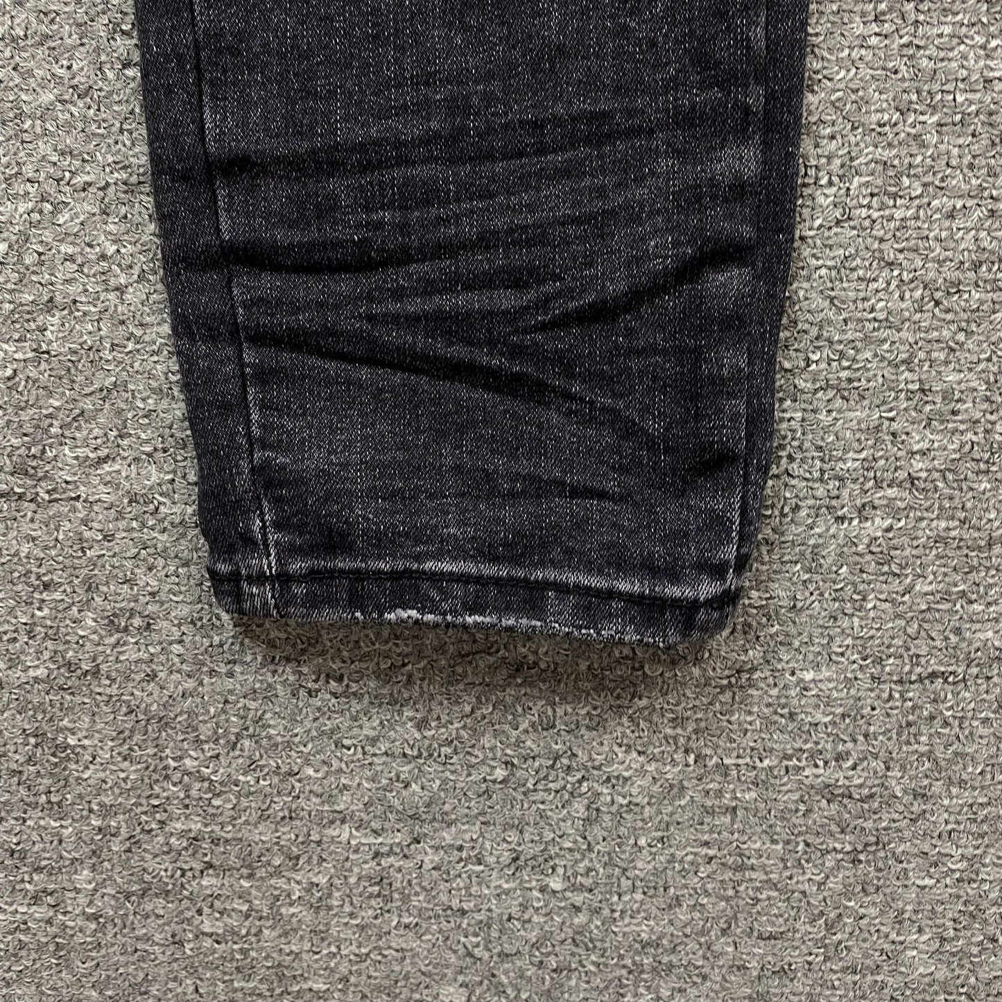 AMIRI VARSITY LOGO REPAIR JEANS
